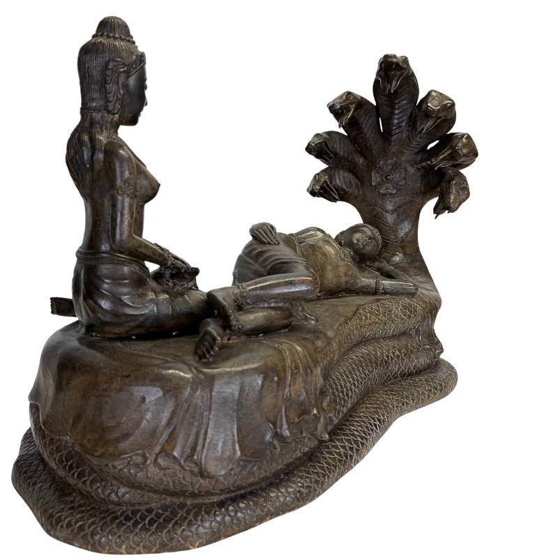Detailed Khmer-style statue of Vishnu and Lakshmi