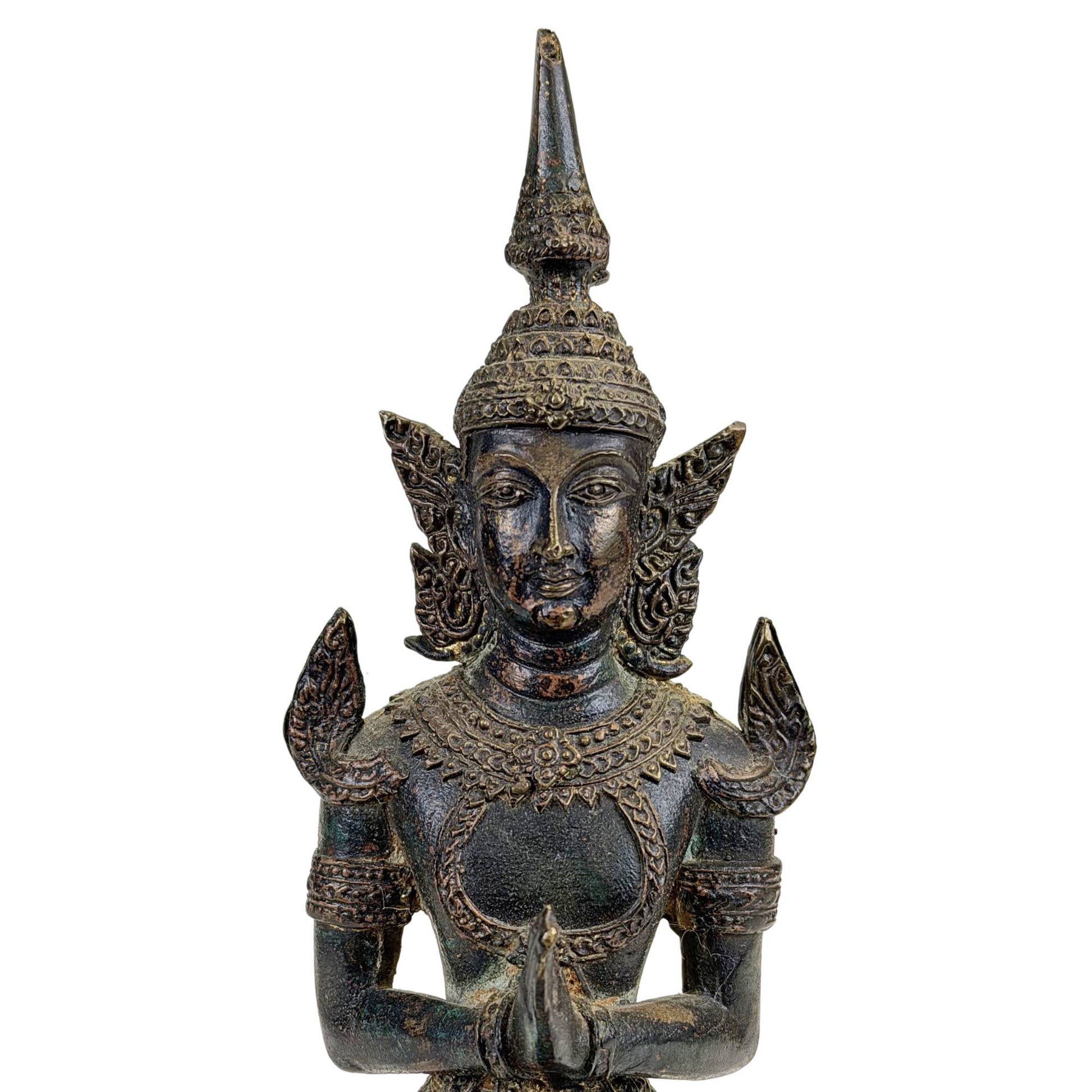 the face of a Thai temple guardian