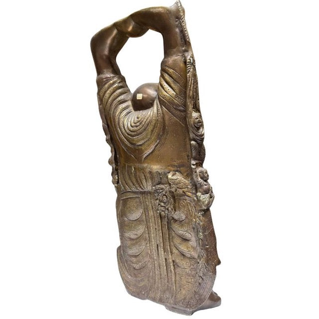 Budai statue with a warm brown and gold-colored patina finish.