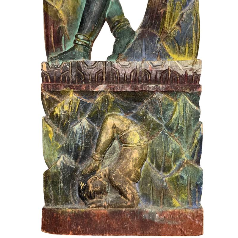 Detail of a rare acrobat at the base of a Balinese temple support
