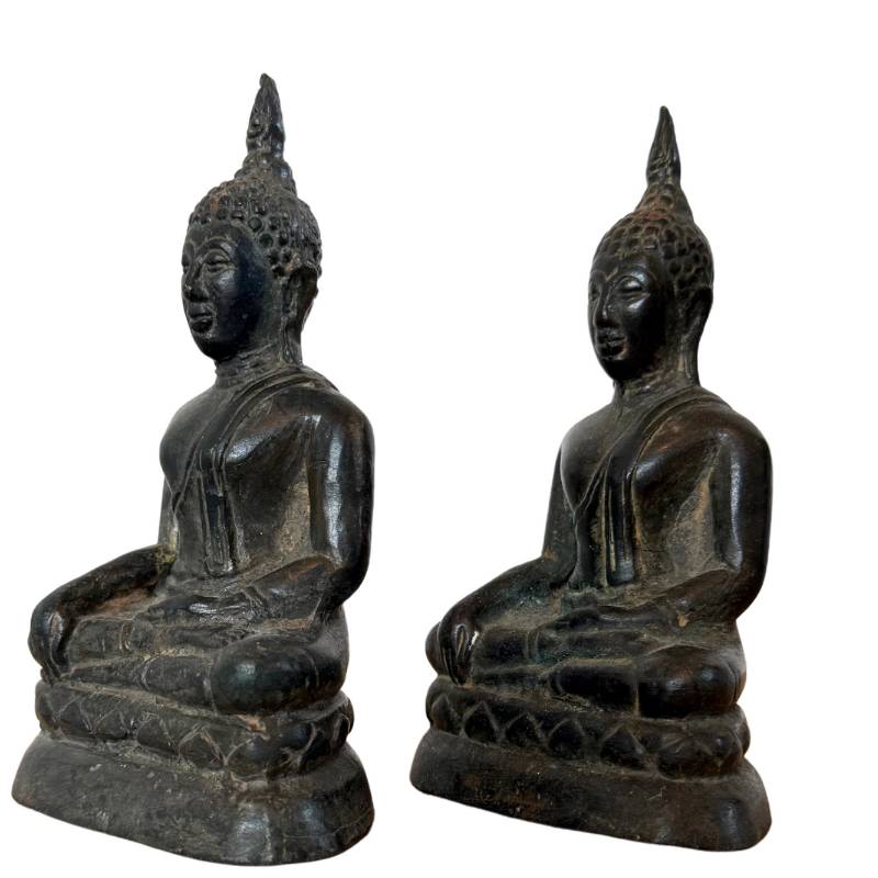 Side view of bronze Buddha statue Thailand Sukhothai influence