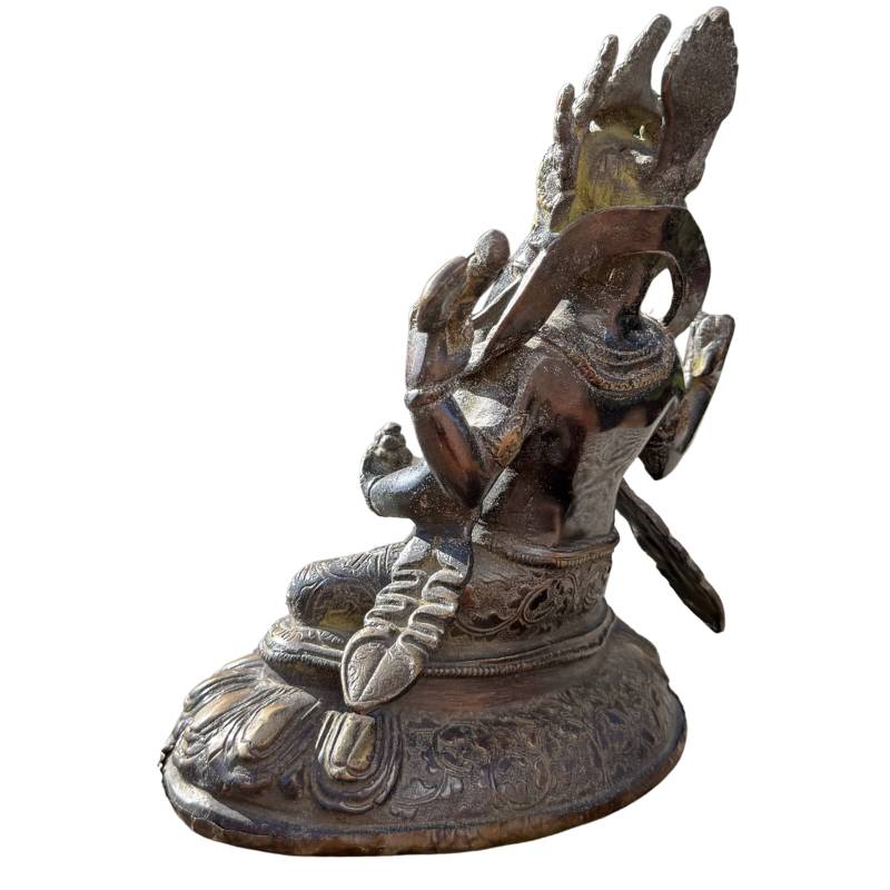 Side view of the 20 cm bronze Ganesha statue, showing the depth of the casting and the refined contours.
