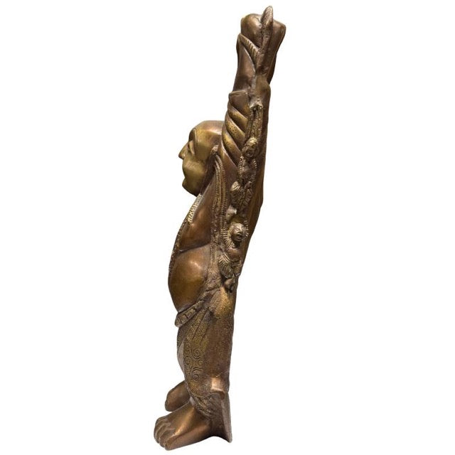 Profile of the monumental bronze Budai statue (46 cm).