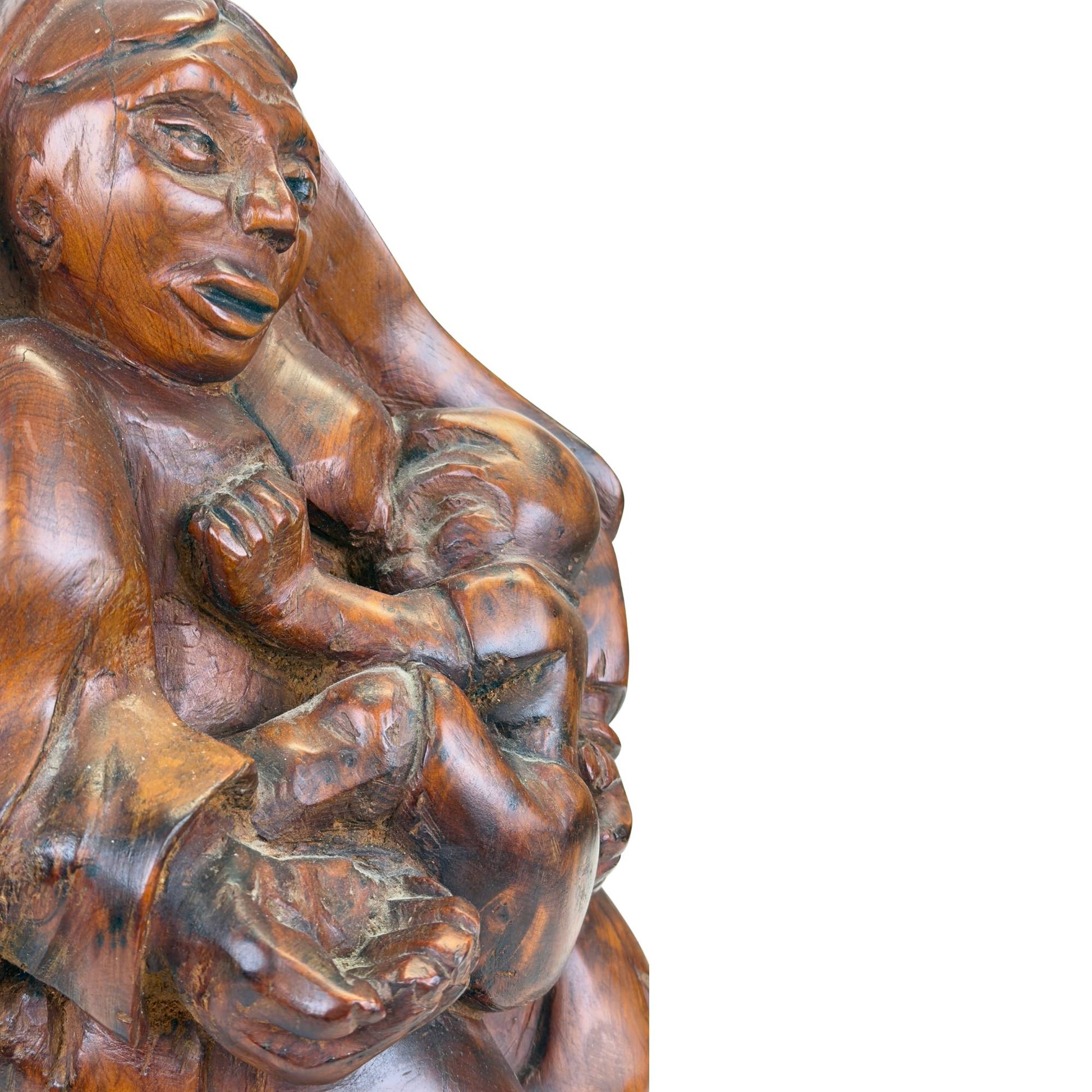 Heavy hand-carved religious art object with Madonna and Child