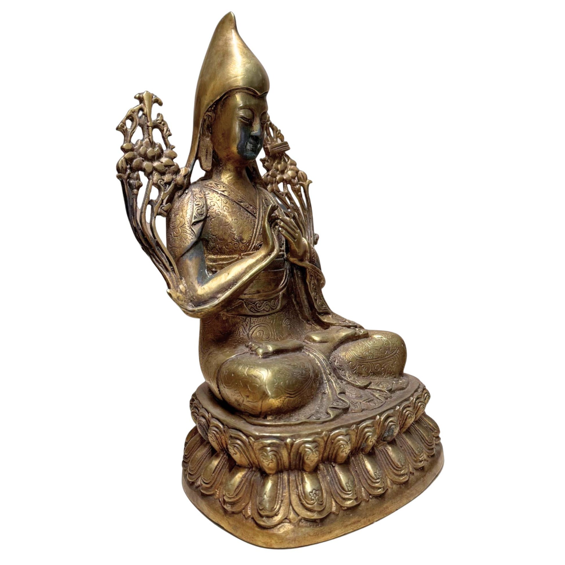 Solid bronze Buddhist statue weighing 2.2 kg.